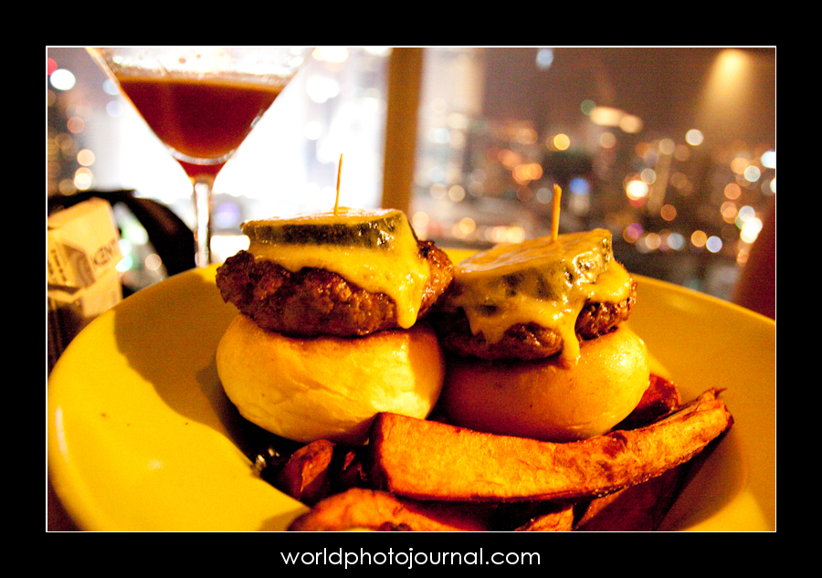 Gourmet Cheeseburgers with Crispy Fries and Cocktail