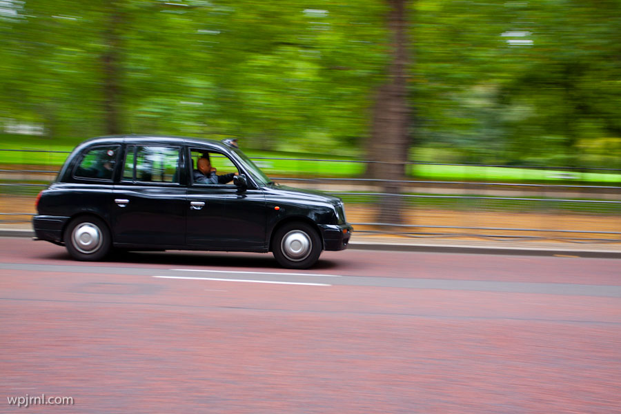 London Street with Black Taxi, England UK