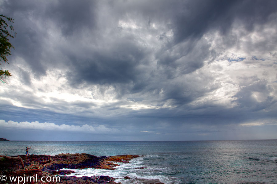 Rocky Coastal Fishing Spot, Tropical Seaside Destination