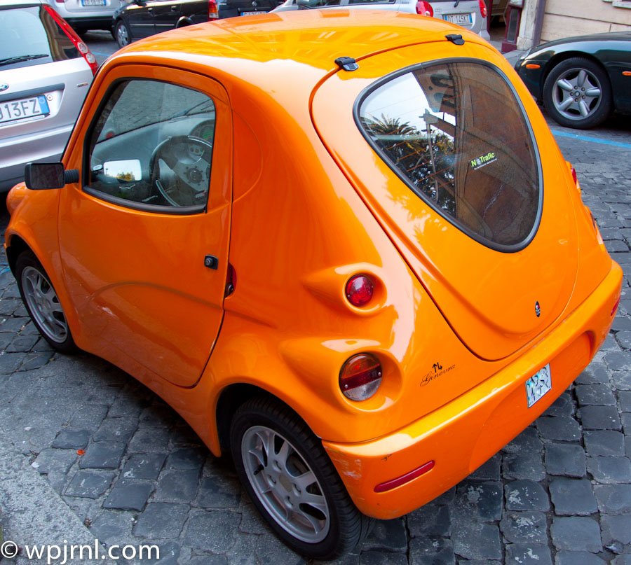 Rome Street Scene - Iconic Orange Micro Car, Italy