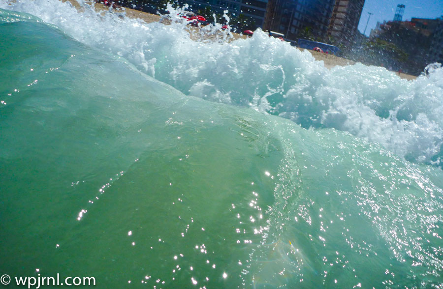 Surfer's Beach with Turquoise Waves, Coastal City
